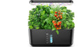 Countertop indoor hydroponic garden with a full-spectrum LED grow light, water level window, growing basil, kale and cherry tomatoes from stacked pods