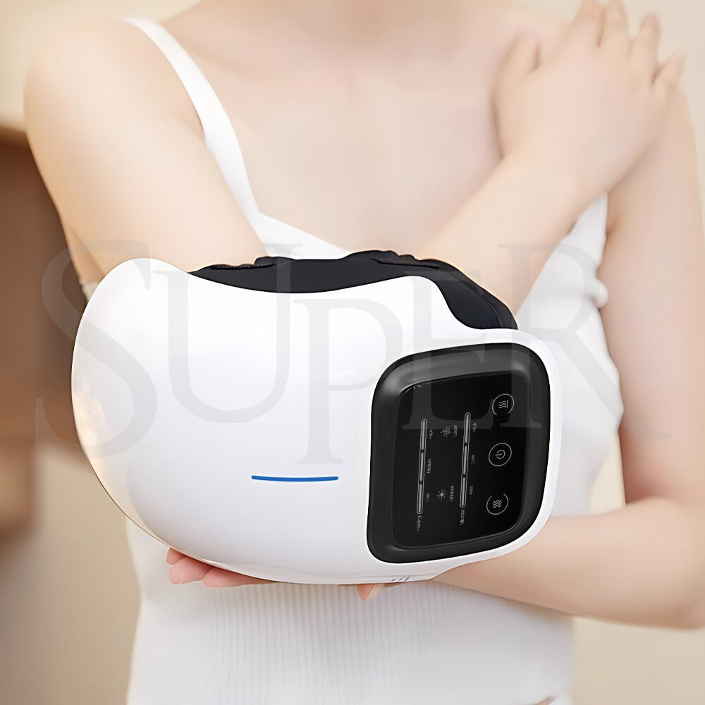 Woman holding the Smart Knee Massager wrapped around her elbow showing the HD touchscreen control panel.